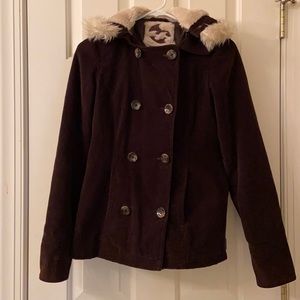 Winter jacket. Missing one button on wrist.